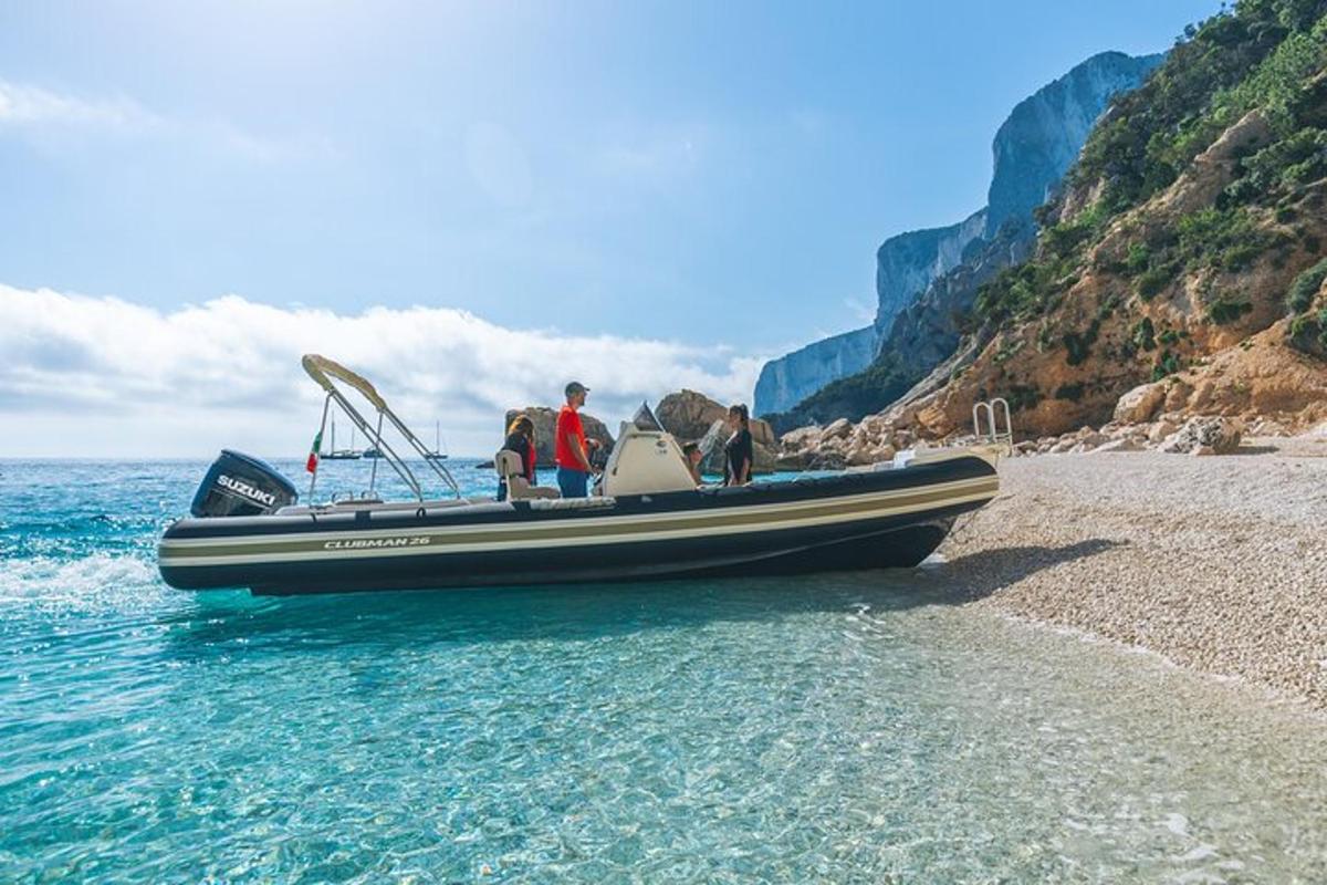 a group of people on a boat on the beach