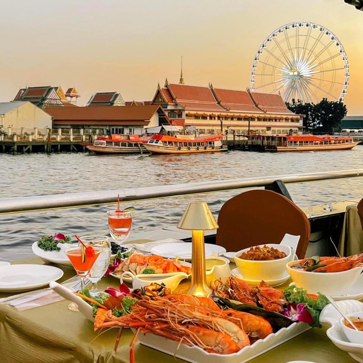 a table with food and a view of the water