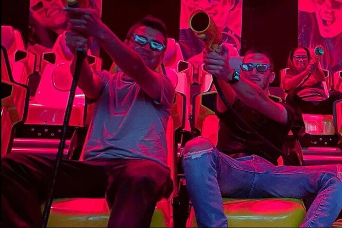 a group of people sitting on chairs in a theatre