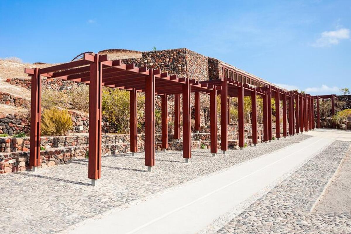 a row of wooden structures on the side of a building