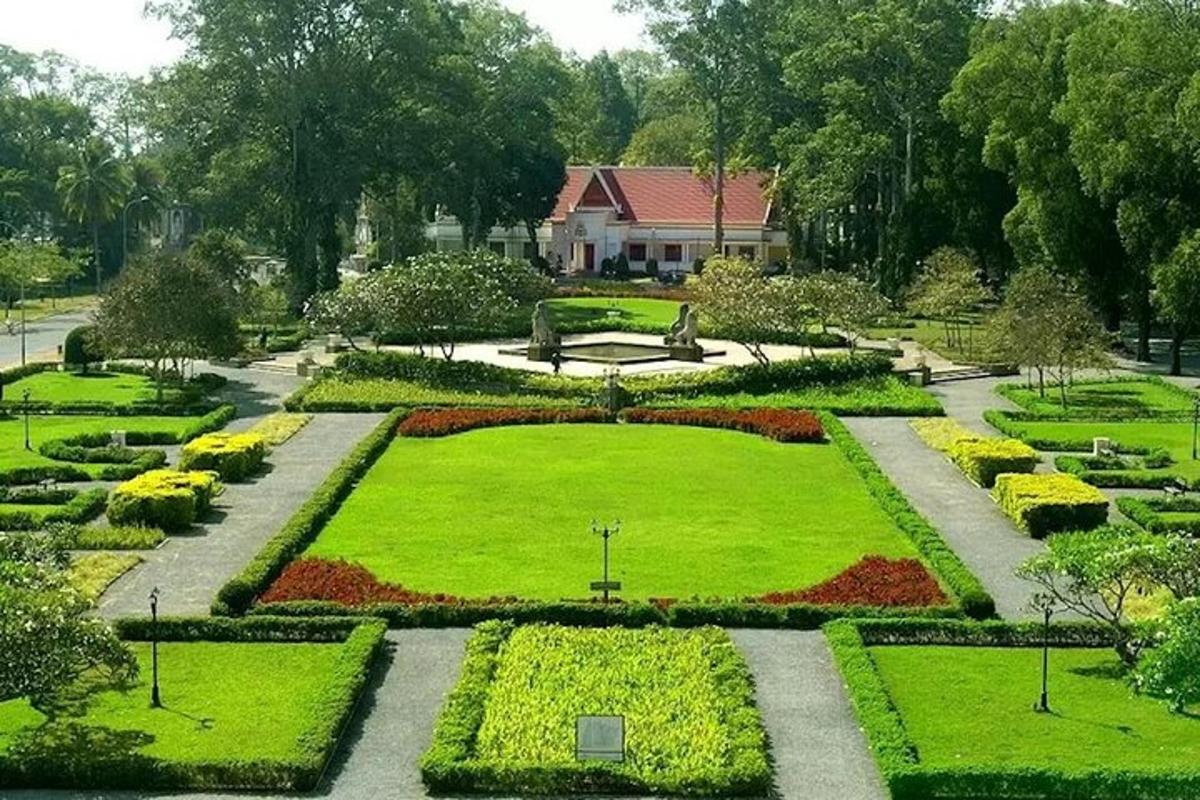 a garden in front of a house with a lawn
