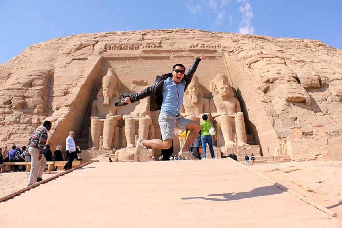 a man is jumping in front of anaraoh