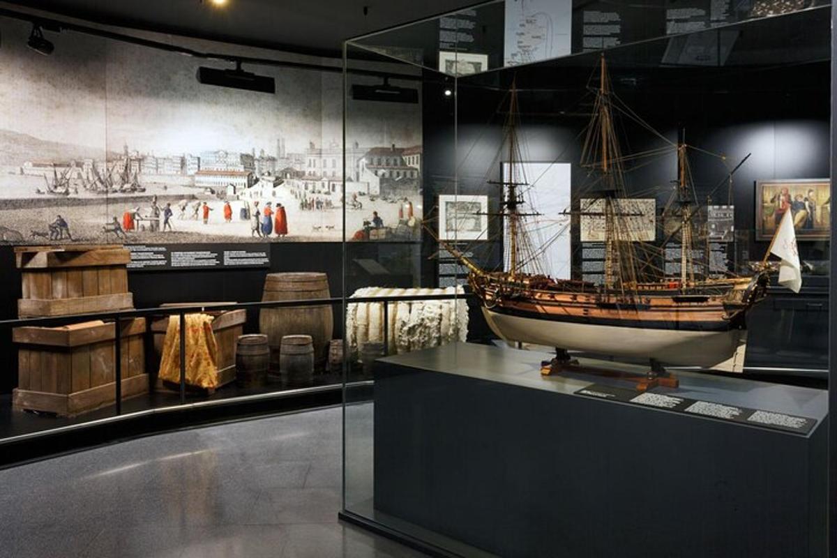 a museum exhibit with a boat on a table