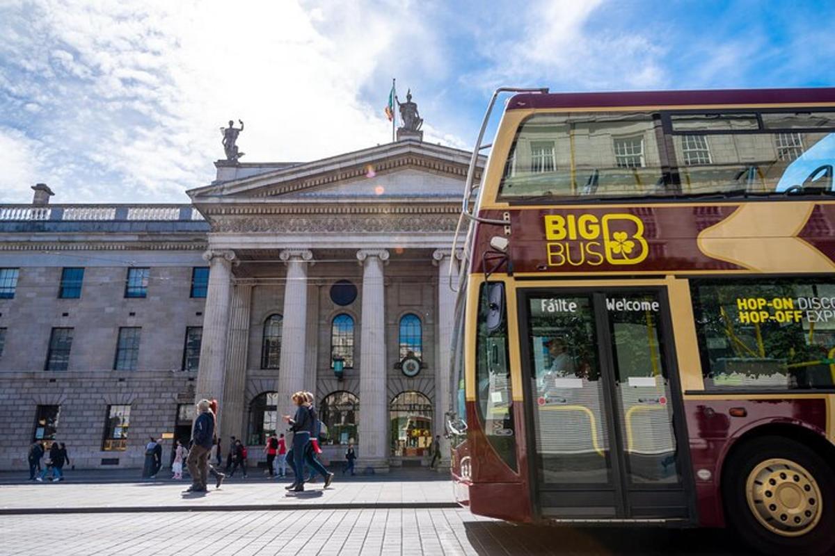 a double decker bus parked in front of a building
