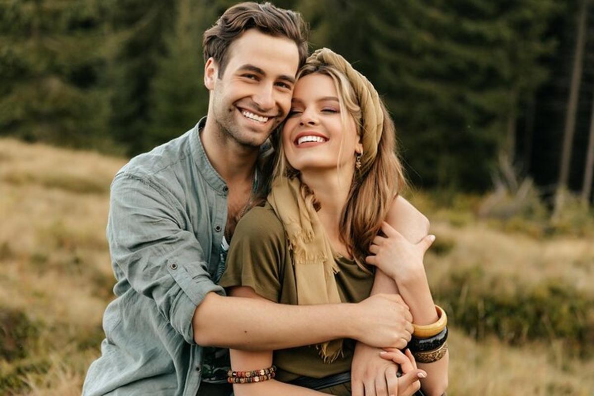 a man and a woman posing for a picture