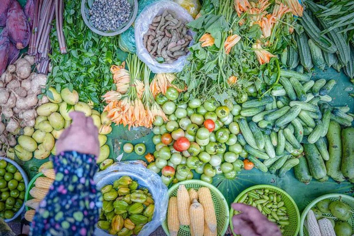 a table filled with lots of fruits and vegetables