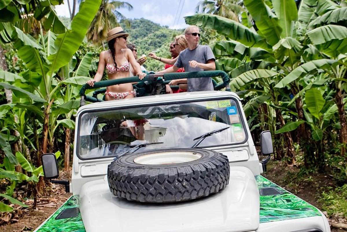 a group of people riding on the back of a truck