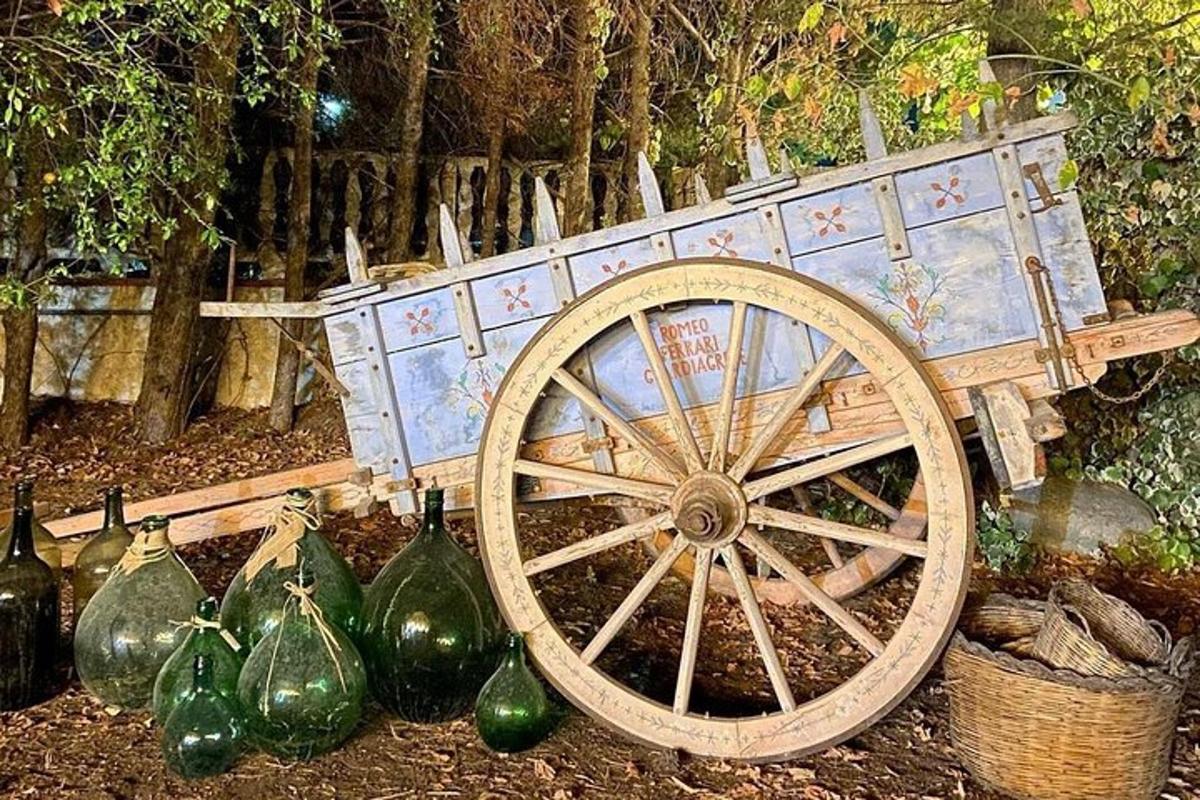 a wooden cart sitting next to a bunch of pumpkins