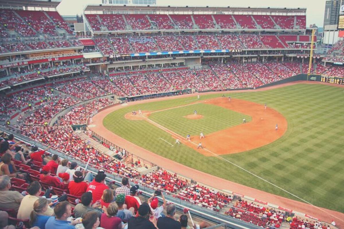 a crowd of people watching a baseball game