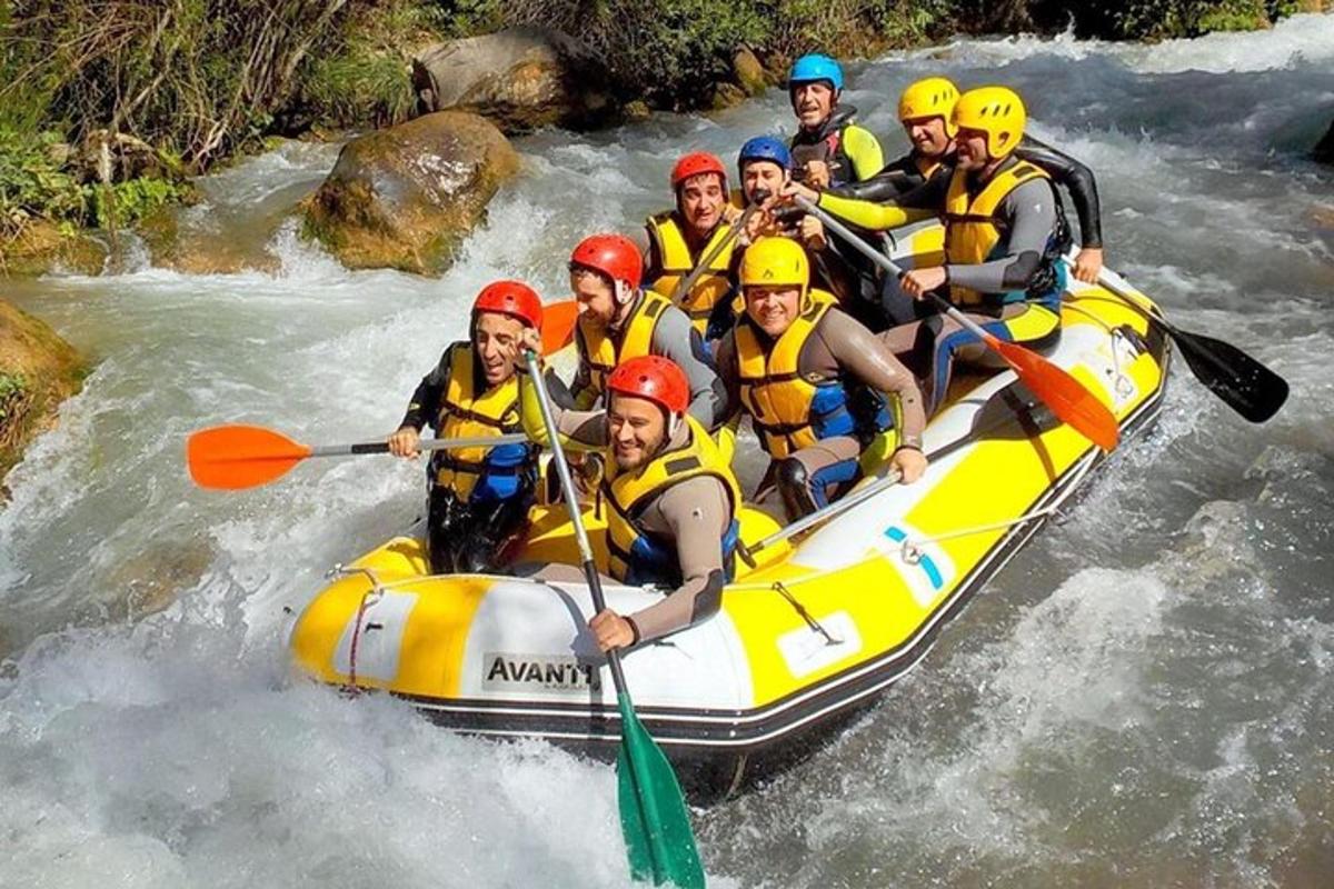a group of people in a raft on a river