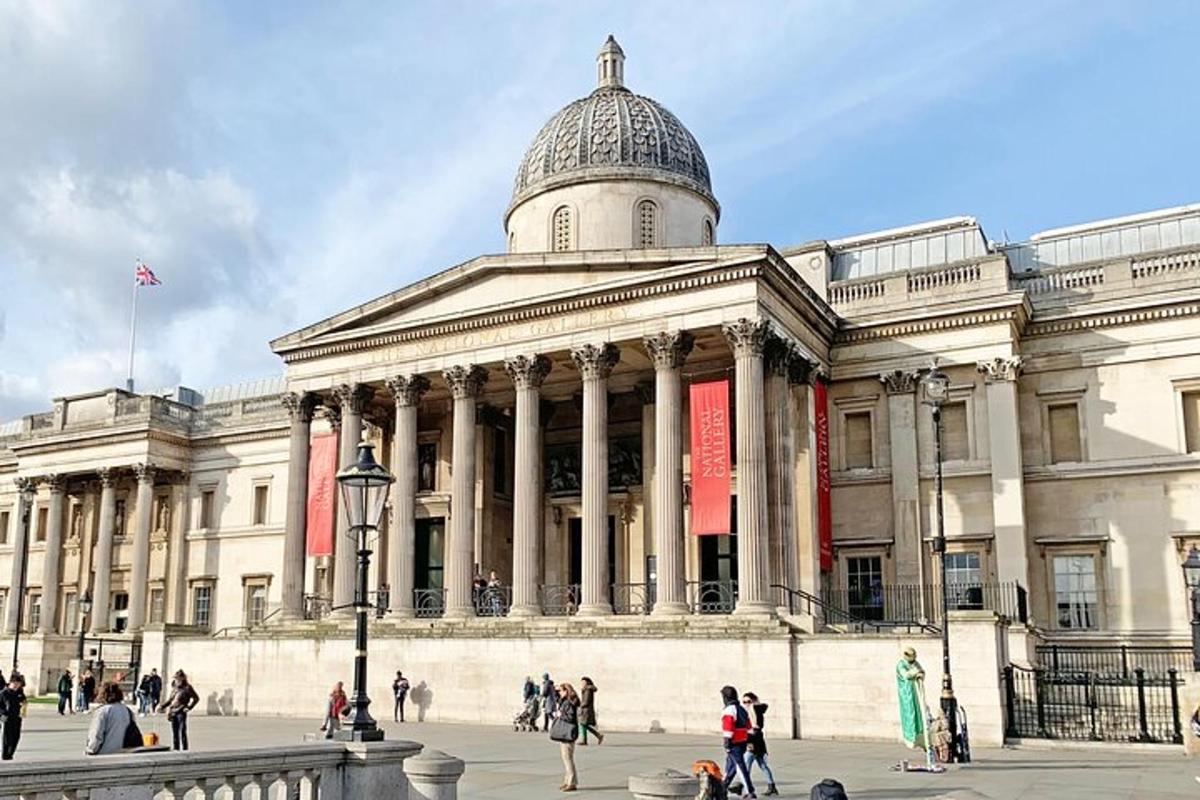 a large building with people walking in front of it