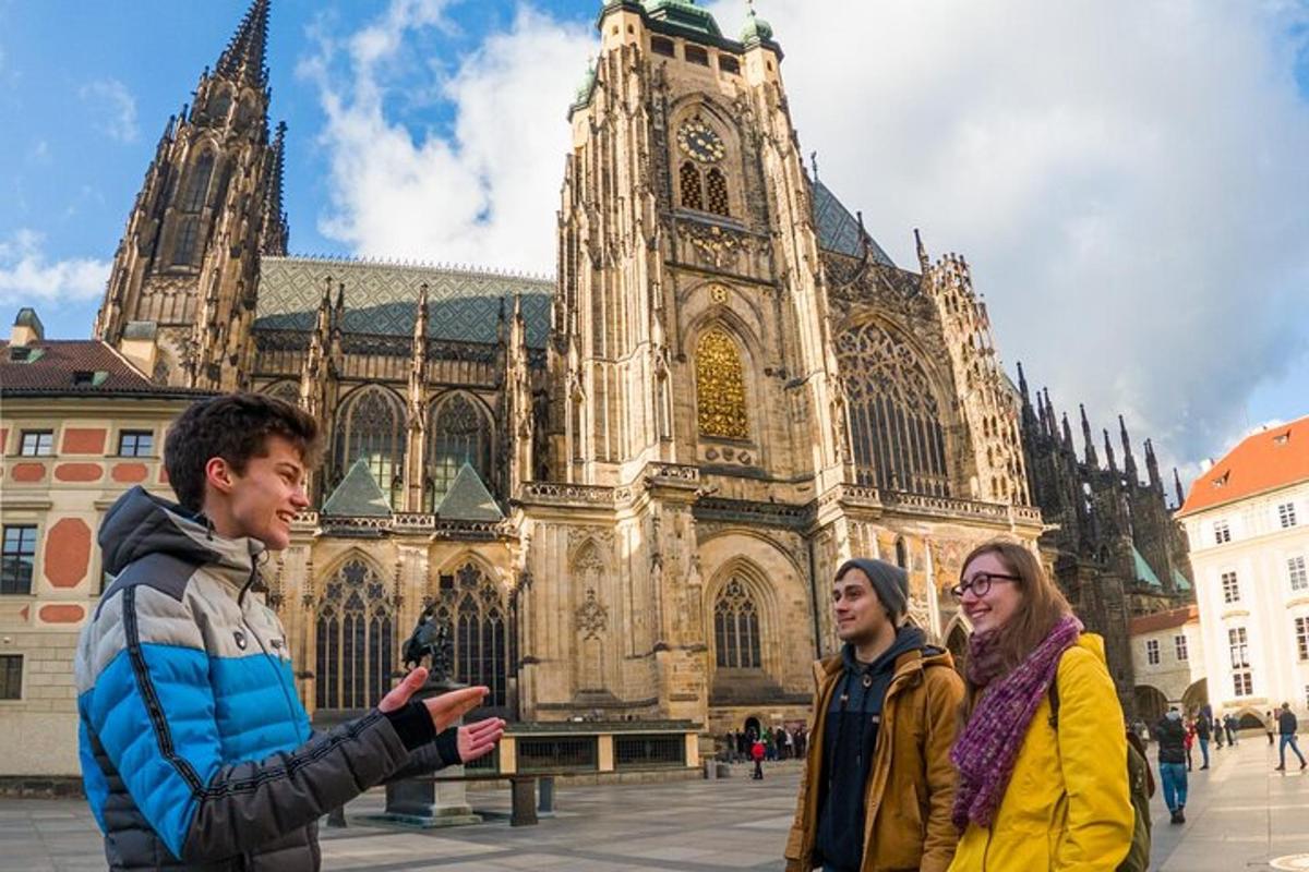 a group of people standing in front of a cathedral