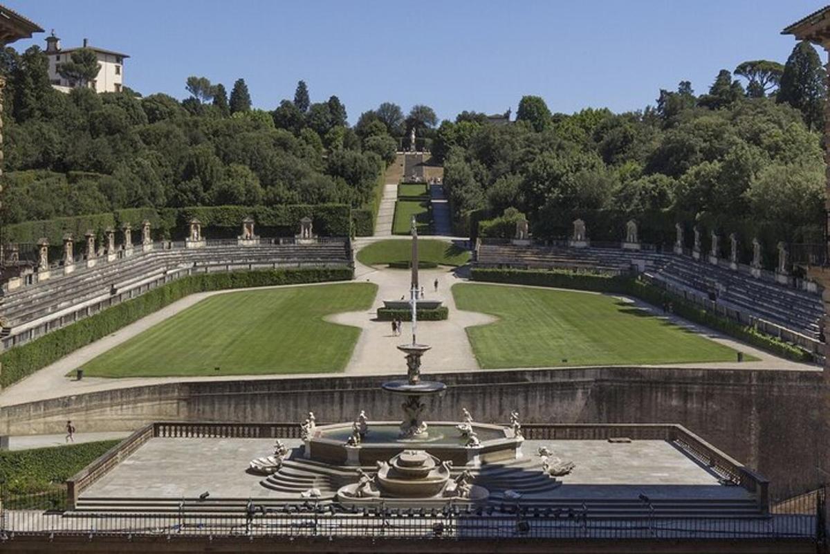 a building with a fountain in the middle of a park
