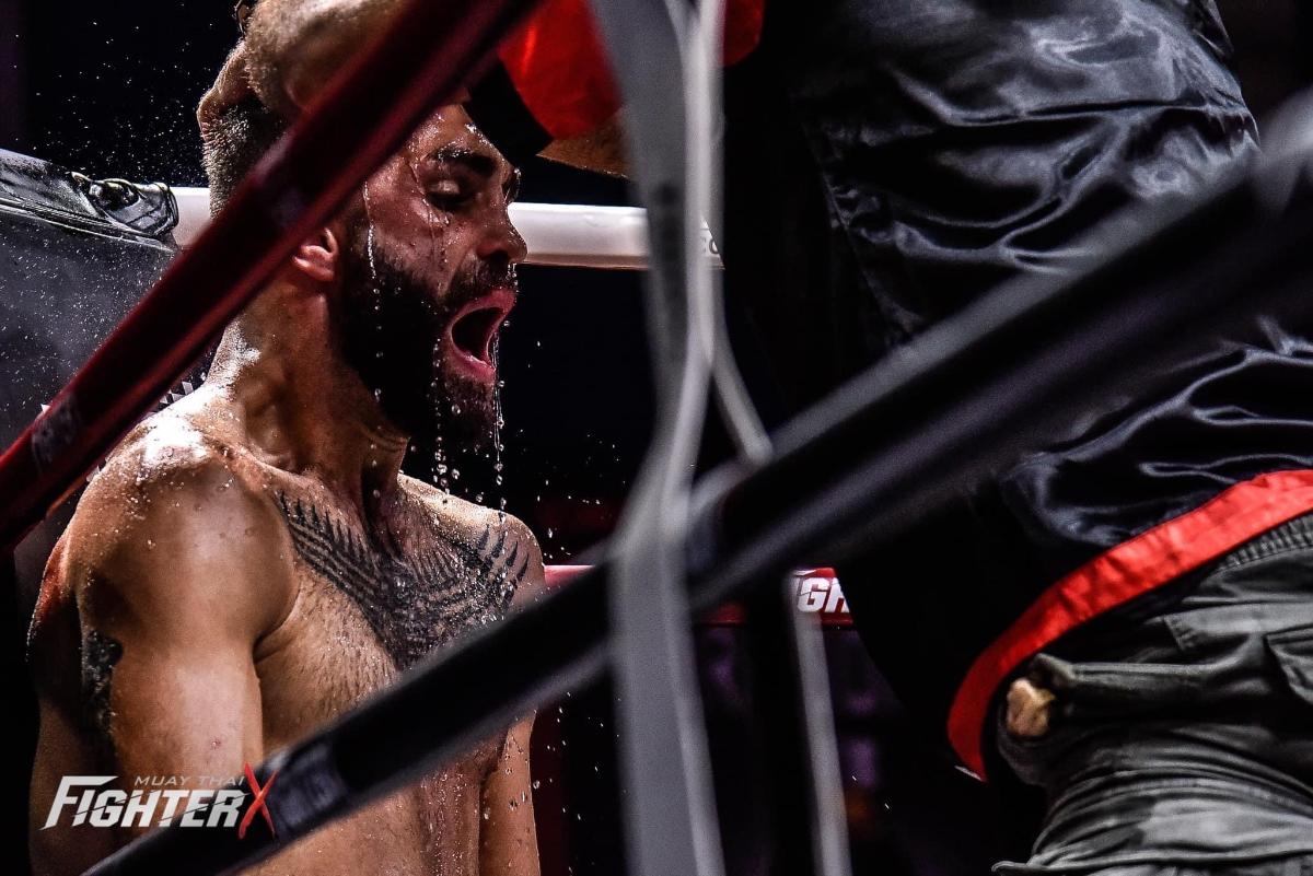 a man in a fight in a boxing ring
