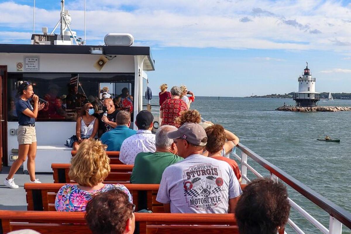 a group of people on a boat in the water