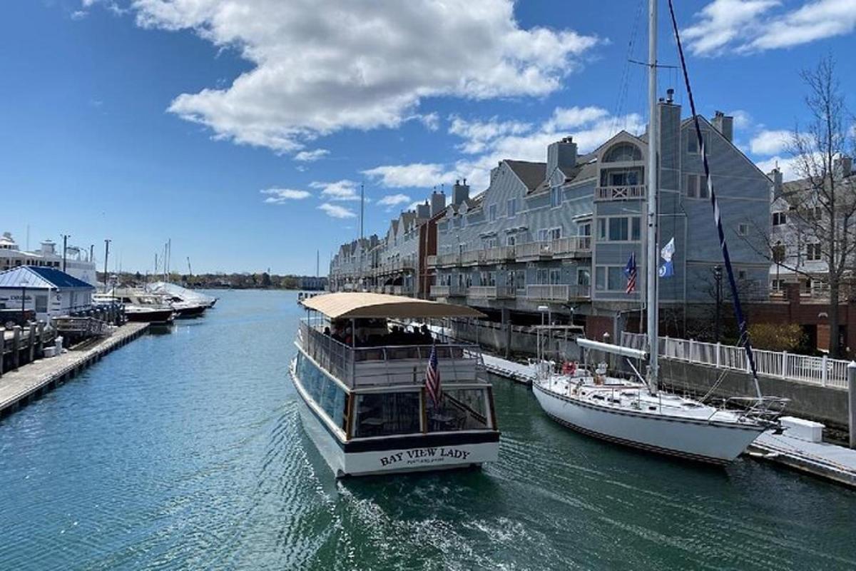 a boat in the water next to a building
