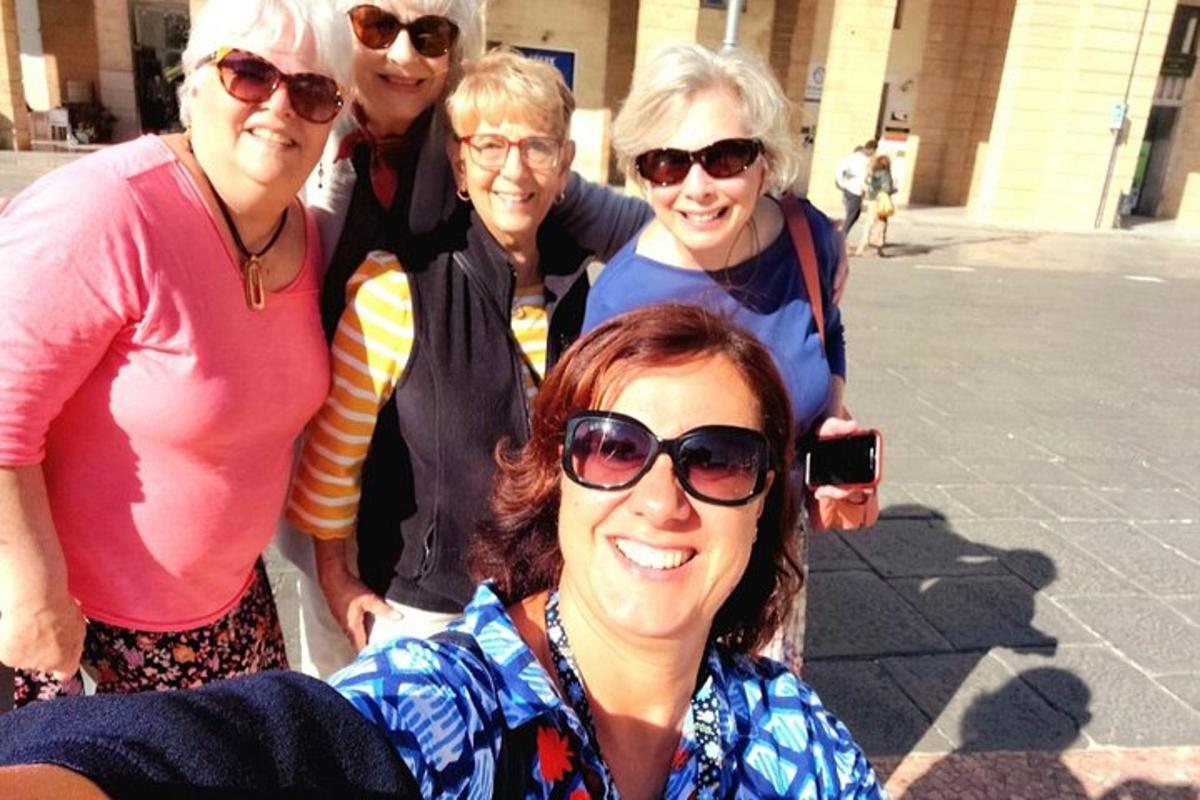 a group of women are posing for a picture