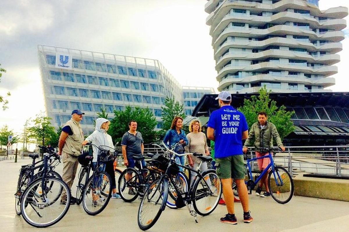 a group of people standing next to their bikes