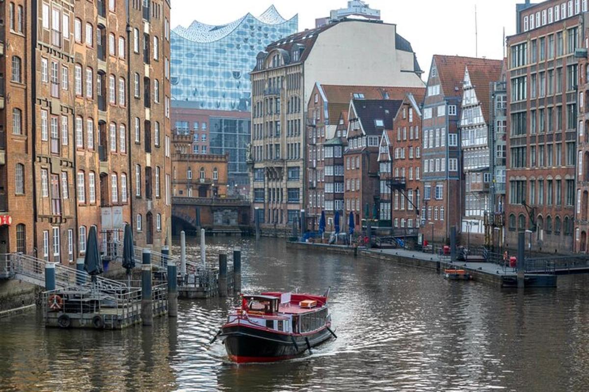 a boat in a river in a city with buildings