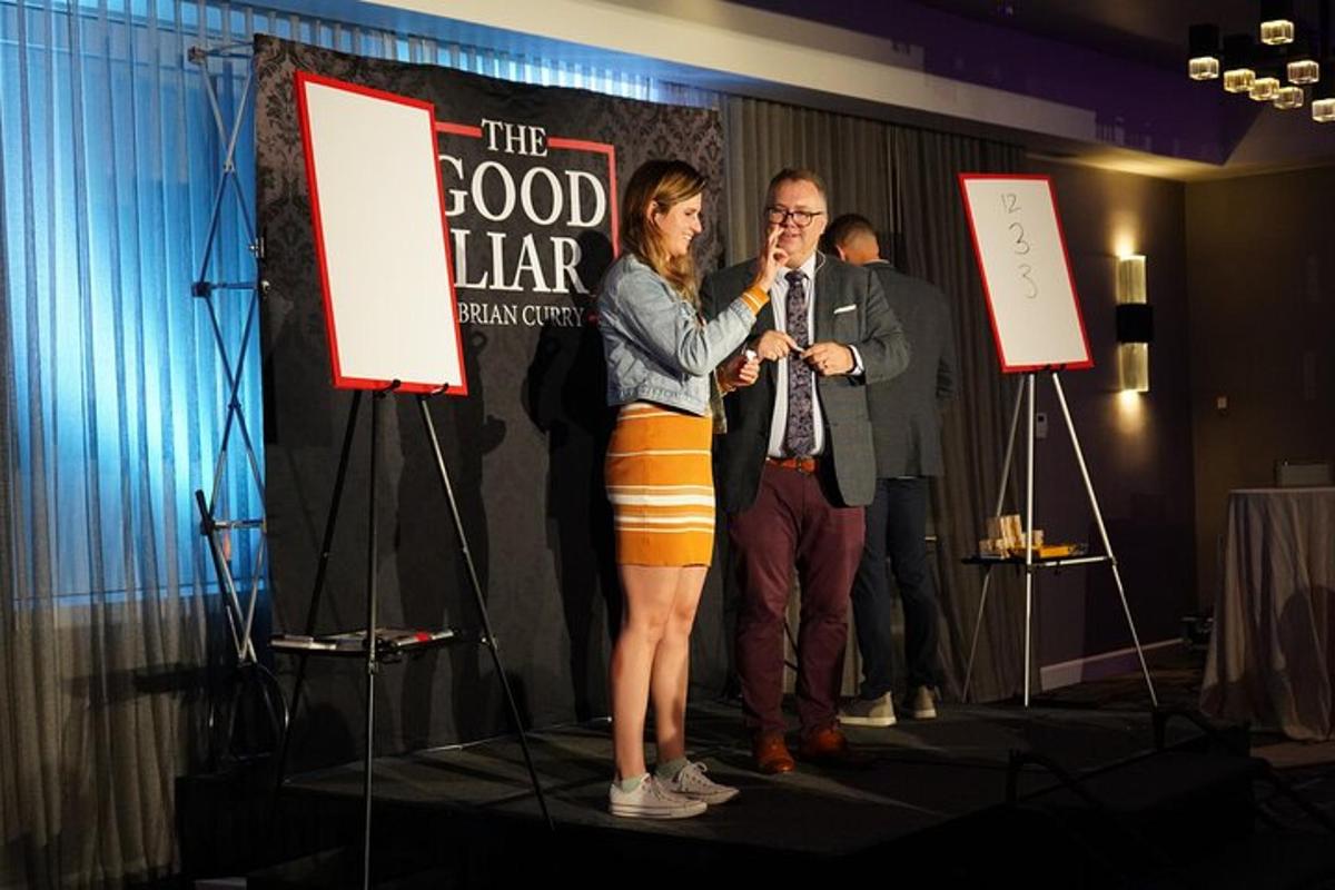 a man and a woman standing on a stage