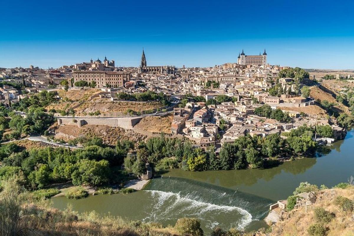 an aerial view of a city with a river