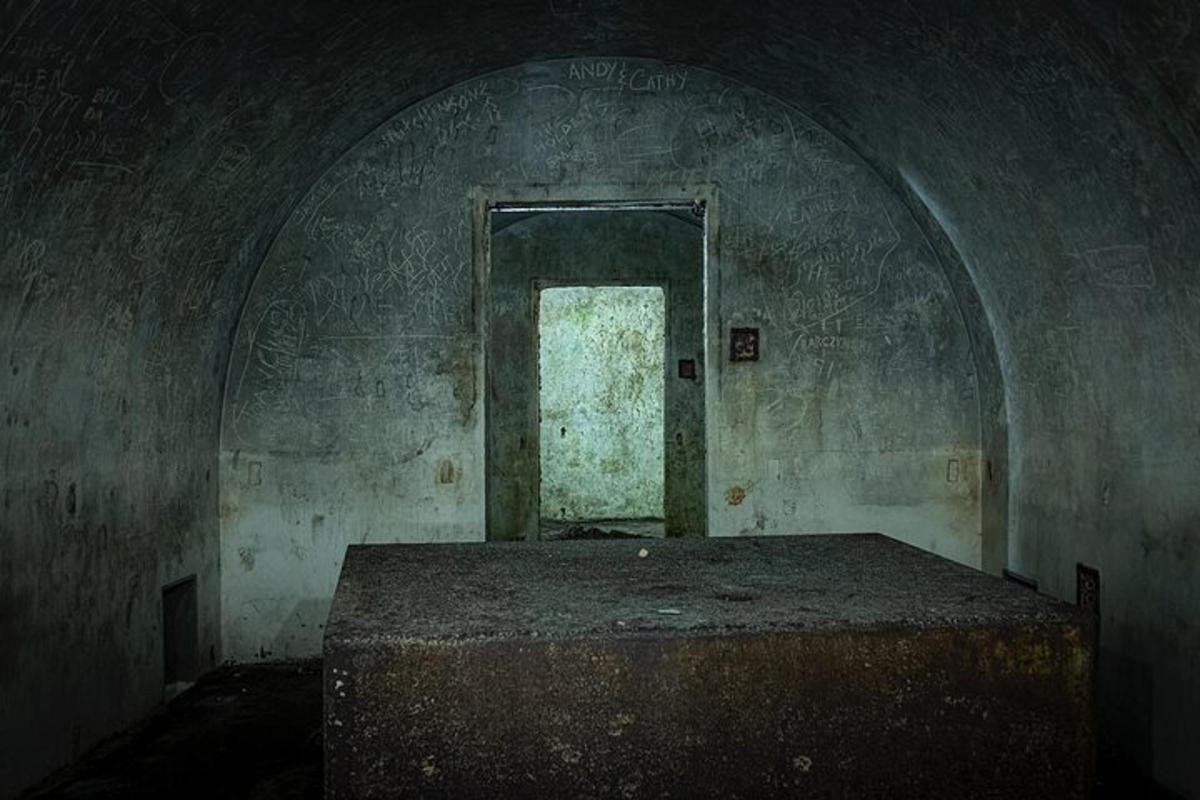 a room with an open door in an old building