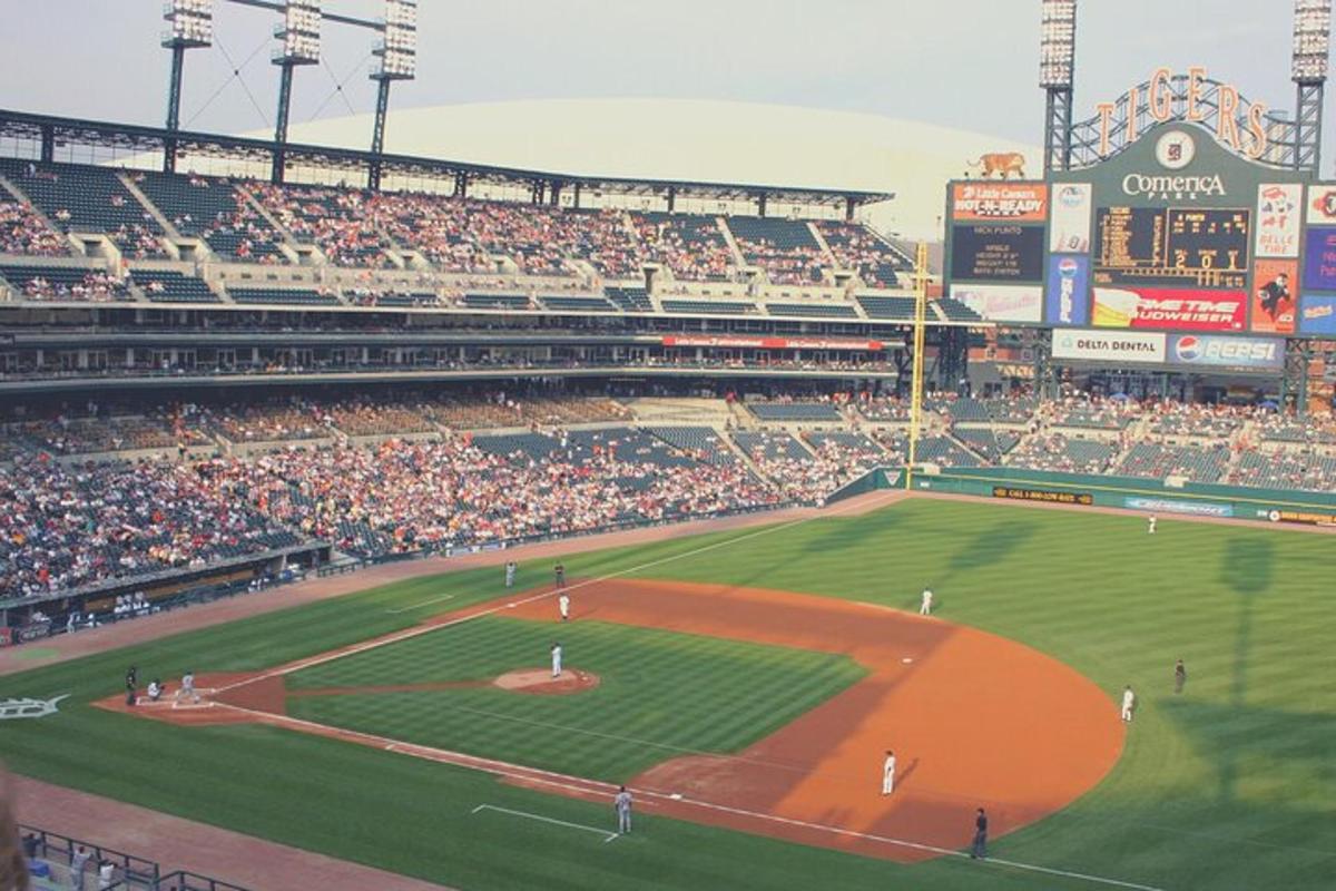 a baseball stadium filled with a crowd of people