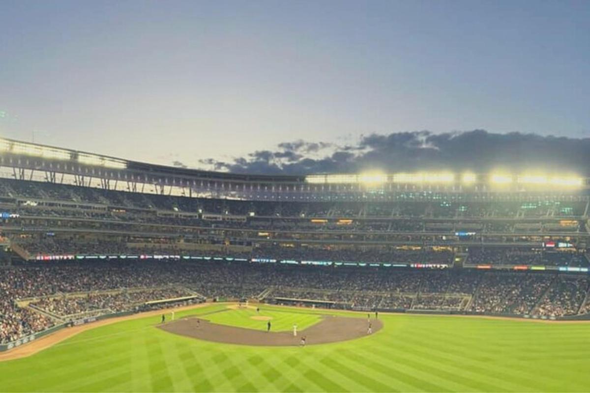 a crowd of people in a baseball stadium