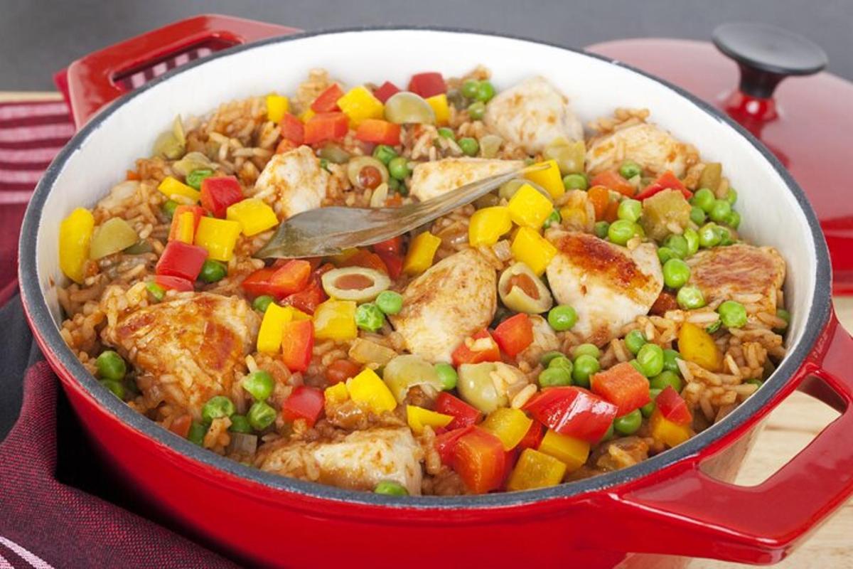 a pan of food with meat and vegetables in it