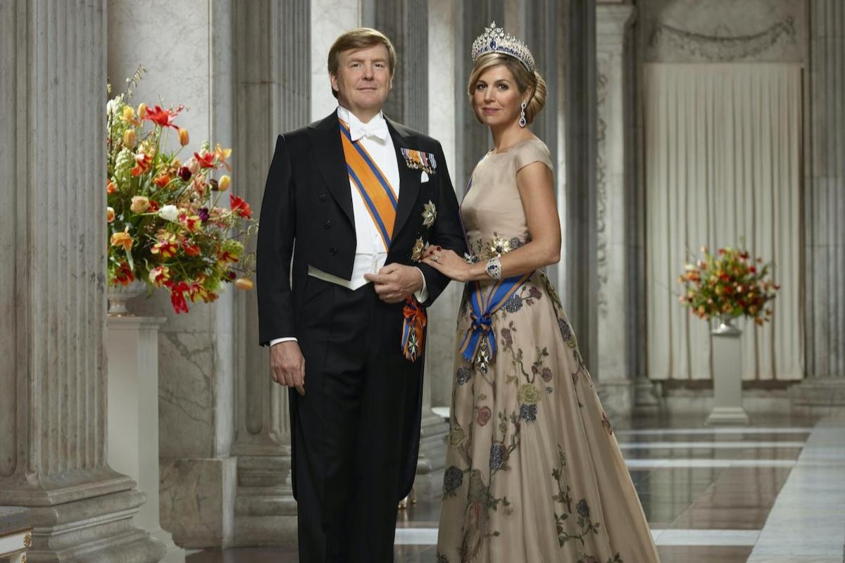 a man and a woman standing next to each other
