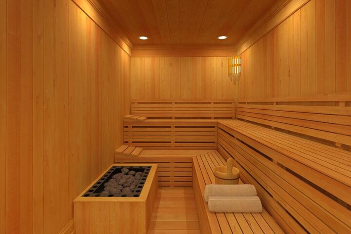 a sauna with wooden walls and wooden flooring