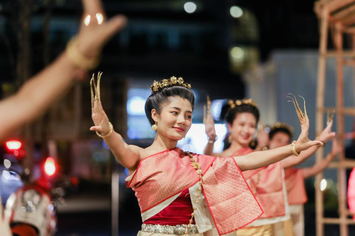 a group of women performing a performance on a stage