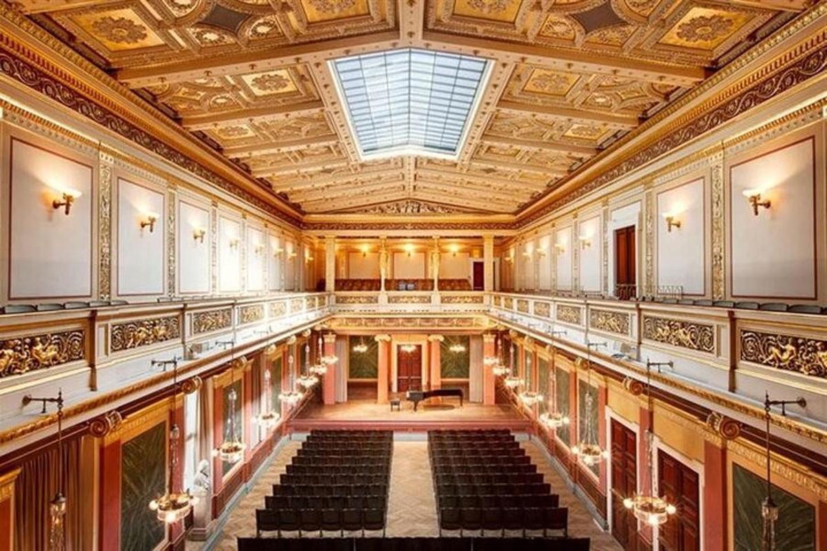 a large hall with a ceiling with a skylight