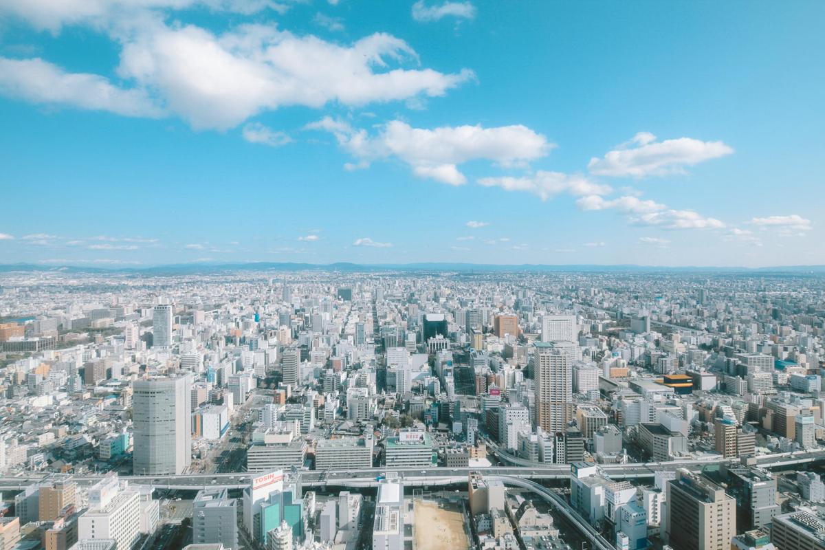 an aerial view of a large city with buildings