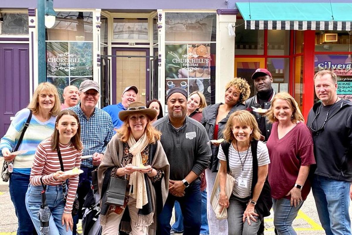 a group of people standing in front of a store