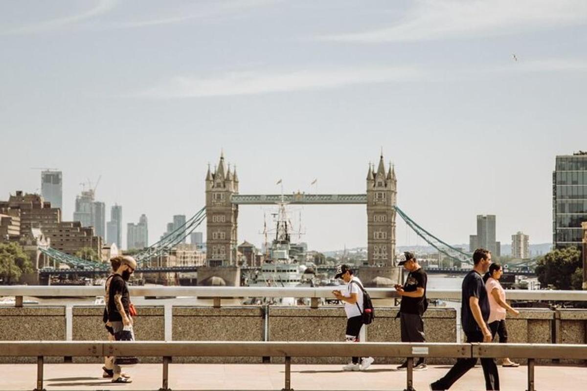 people walking in front of the tower bridge