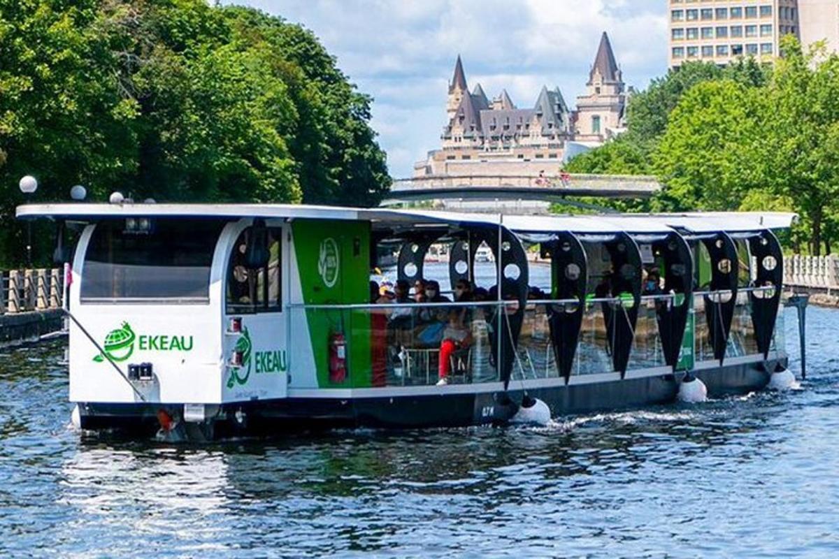 a ferry boat on a river in a city