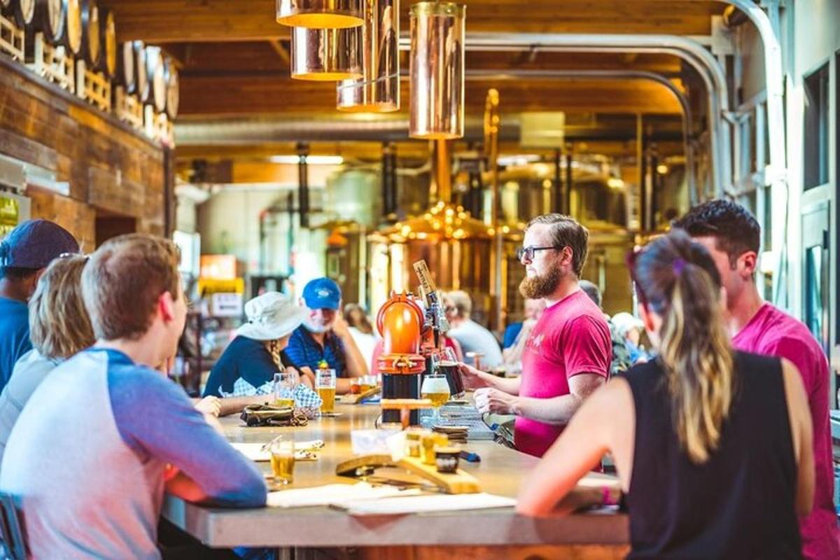 a group of people sitting at a table in a restaurant