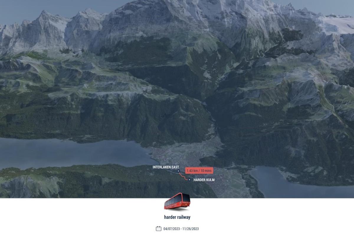 a view of a mountain range with a red sign