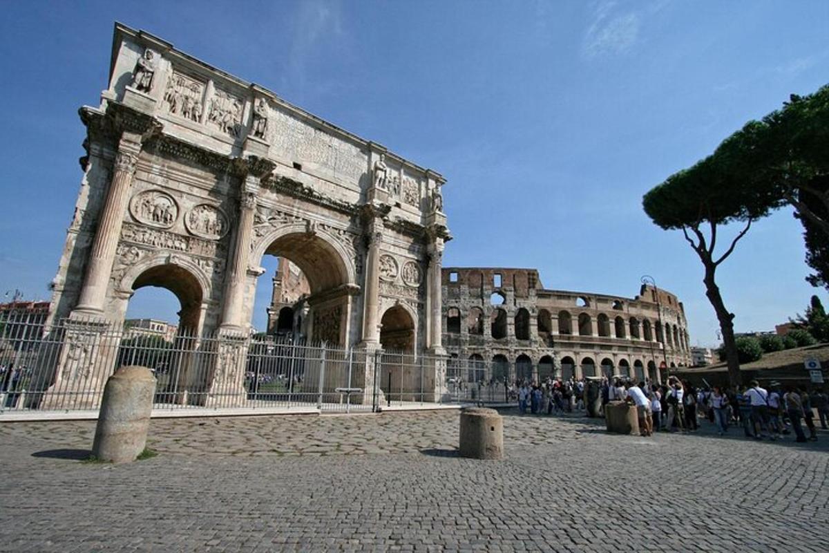 a building with an arch in front of it