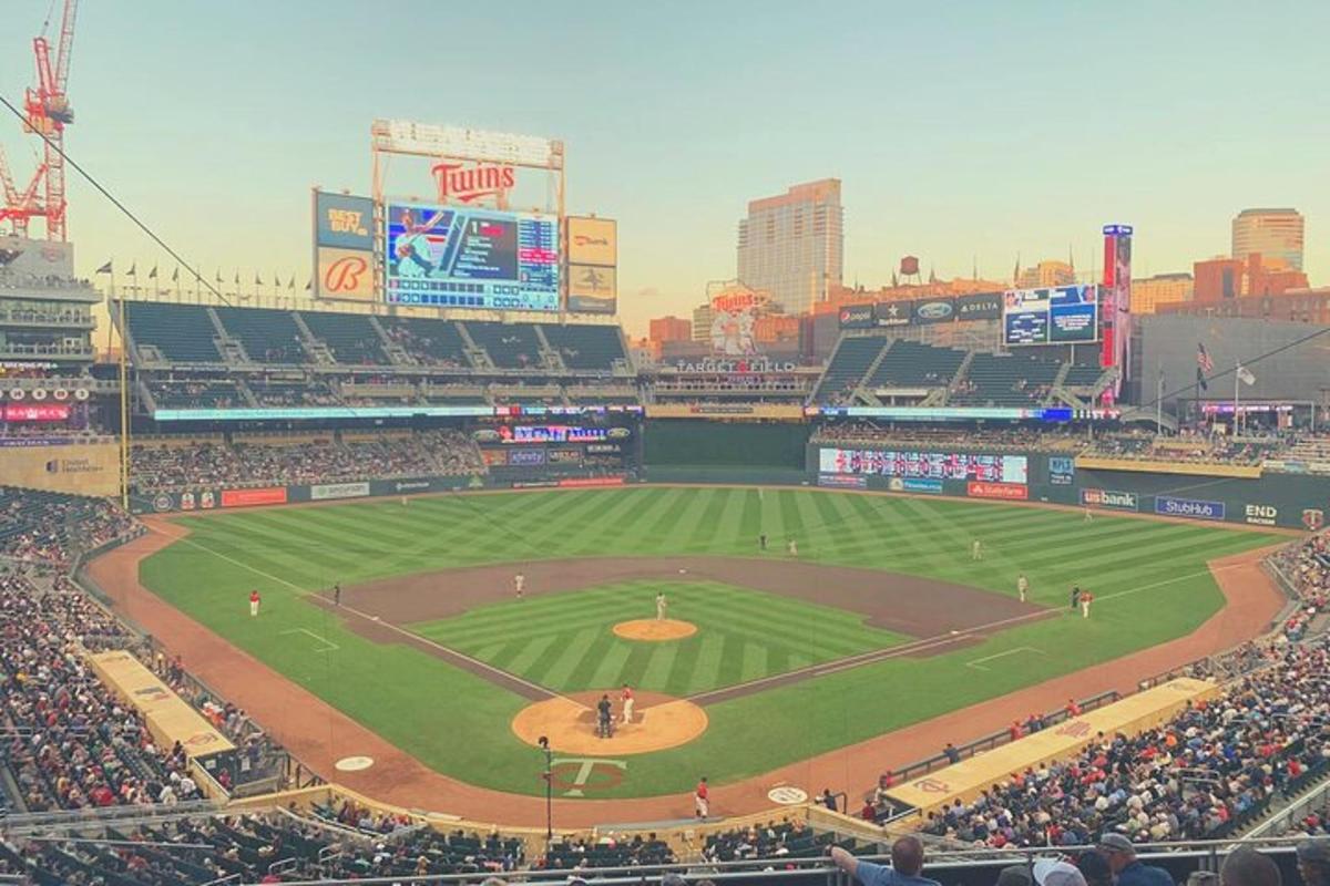 a baseball game in a stadium with a crowd