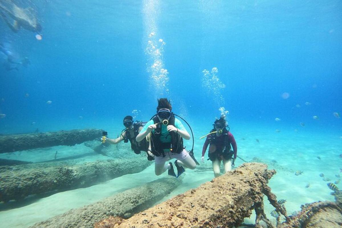 two people are scuba diving in the ocean