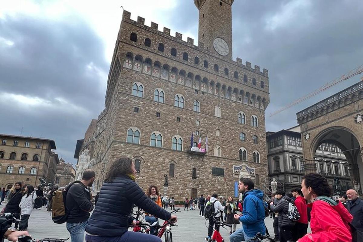 a group of people standing in front of a large building