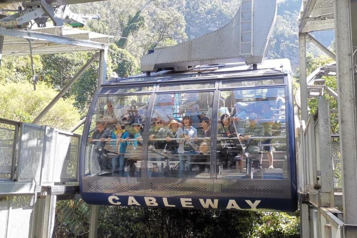 a group of people riding on a roller coaster