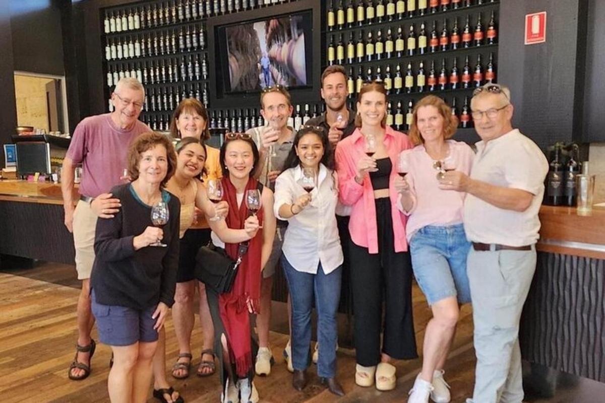 a group of people posing for a picture at a bar
