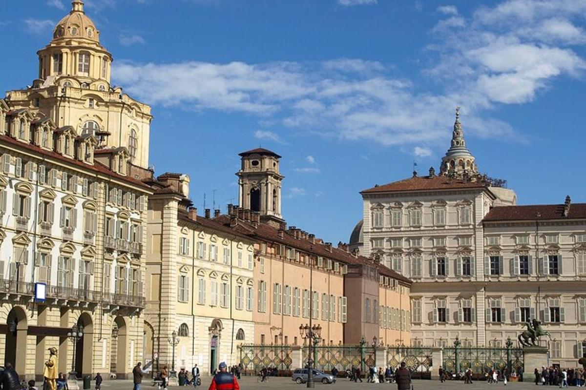 a large building with people walking in front of it