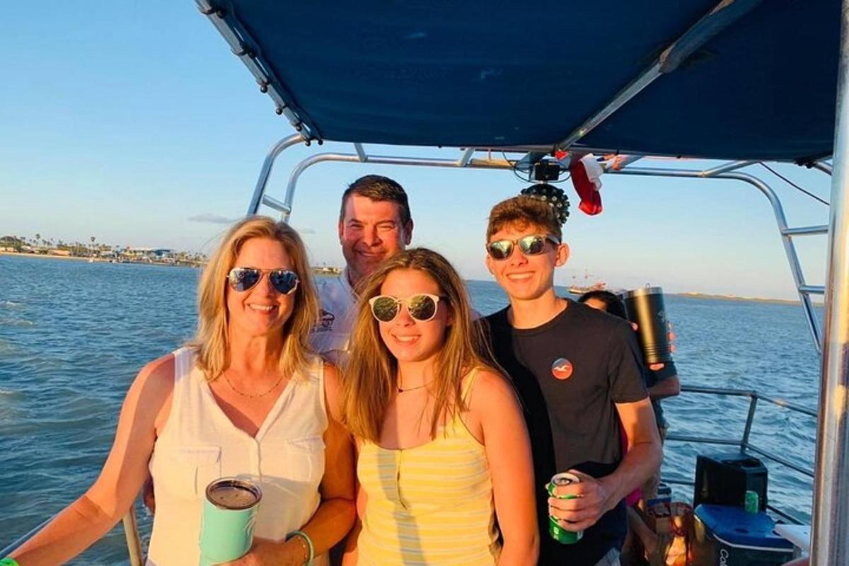 a group of people on a boat in the water
