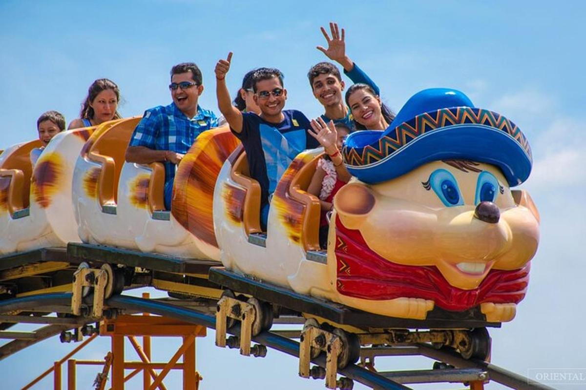 a group of people riding on a roller coaster
