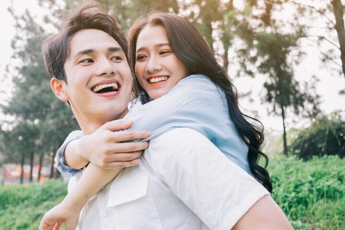 a man and a woman hugging each other