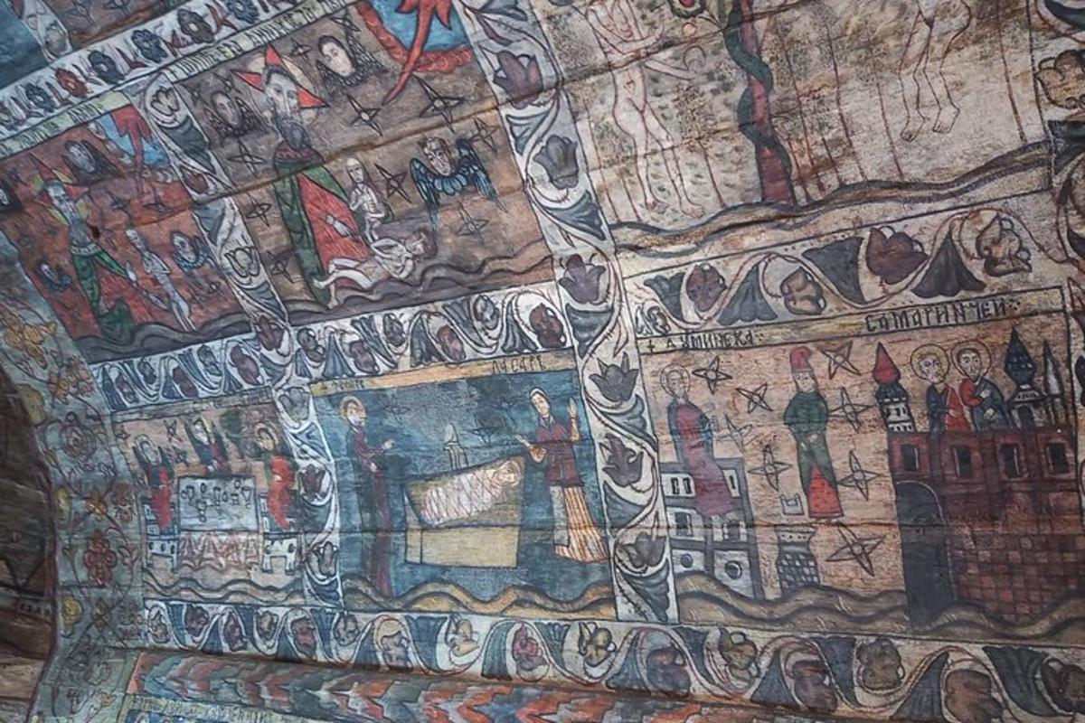 a tapestry with a depiction of a city